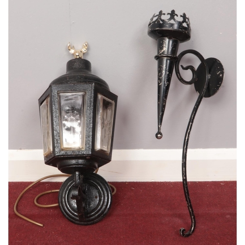 380 - A vintage coach lantern & decorative wall candle holder.