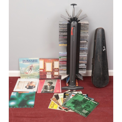 387 - Three items of musical interest - to include a battery operated revolving CD Power Tower and content... 