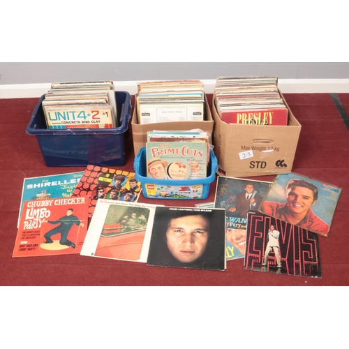 423 - Four boxes of LP records. Includes Elvis Presley, Everly Brothers, Rod Stewart, The Police etc.