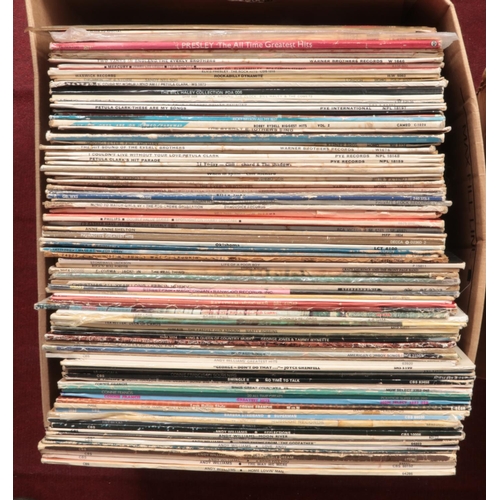 423 - Four boxes of LP records. Includes Elvis Presley, Everly Brothers, Rod Stewart, The Police etc.