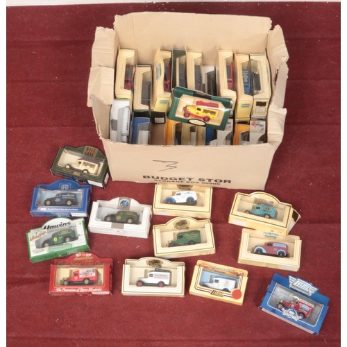 444 - A collection of boxed Lledo diecast model vehicles. Includes promotional models. (approximately 38).