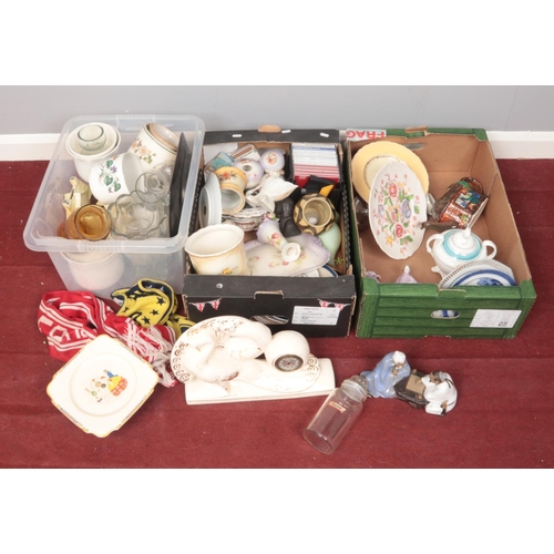 472 - Three boxes of miscellaneous. Includes pottery mantel clock, cake stands etc.