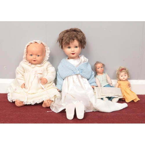 480 - Four vintage dolls - all with moving limbs. Tallest 66cm.