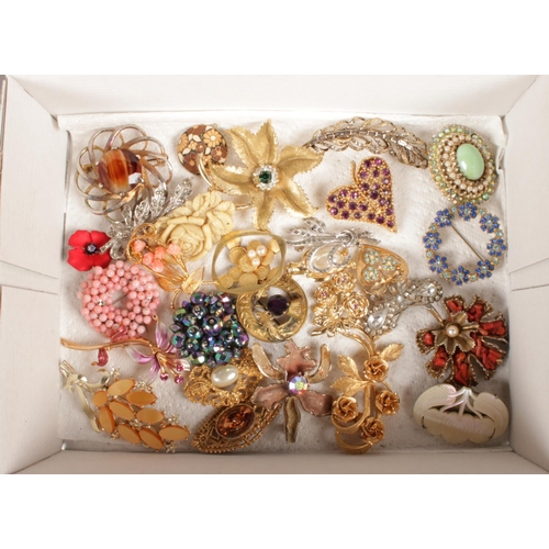 99 - A box of 28 costume jewellery brooches.