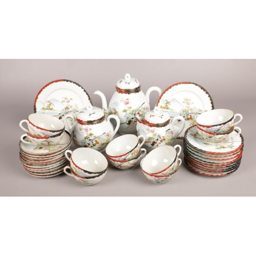 111 - A Thirty-Five Piece Oriental Tea Service. Comprising of: Teapot, Milk Jug, Sugar Bowl and Ten Cups a... 