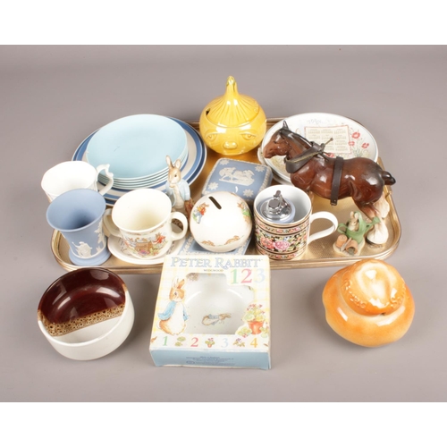 117 - A tray of mixed ceramics. Includes Royal Albert Peter Rabbit, Cornishware, novelty storage pots, Poo... 