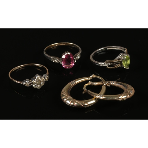 250 - A collection of 9ct gold and silver jewellery. Includes three vintage rings and a pair of hoop earri... 