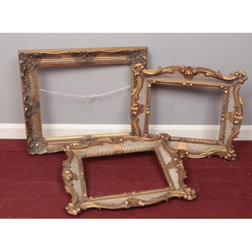 403 - Three gilt framed picture frames. 67x57 cm.