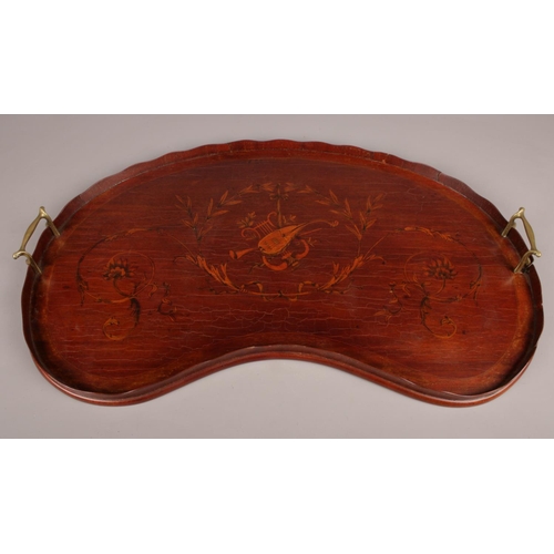 408 - A Victorian Mahogany kidney shaped serving tray. with wavy rim and brass carrying handles. (67 x 36 ... 