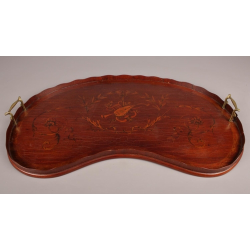 408 - A Victorian Mahogany kidney shaped serving tray. with wavy rim and brass carrying handles. (67 x 36 ... 