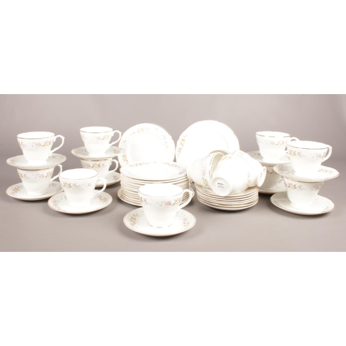 79 - A Mayfair tea set. cups/saucers, side plates.