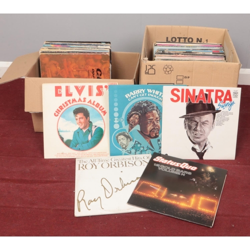 502 - Two Boxes of LP vinyl records. Sinatra, Barry White, Elvis, Status Quo examples etc.