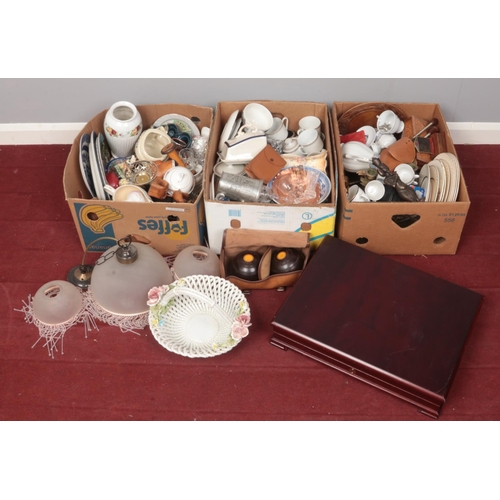 505 - Three boxes of miscellaneous. Includes light shades, large cutlery box, Thomas Taylor bowls etc.