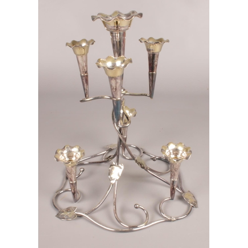 89 - A silver plate candelabra with leaf detailing. 37cm height.