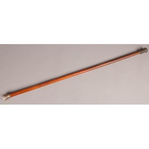 101 - A malacca cane with white metal pummel.