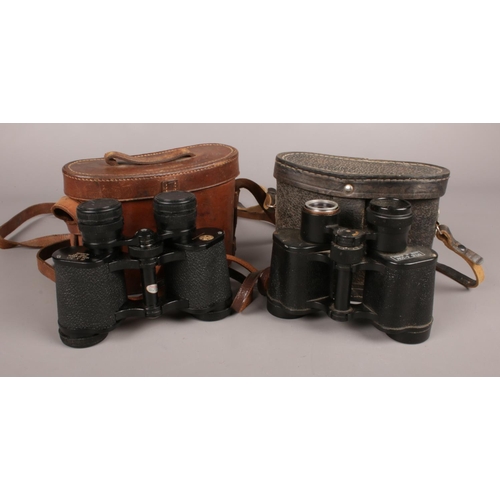 114 - A cased pair of Russian binoculars along with cased pair of CBC binoculars.