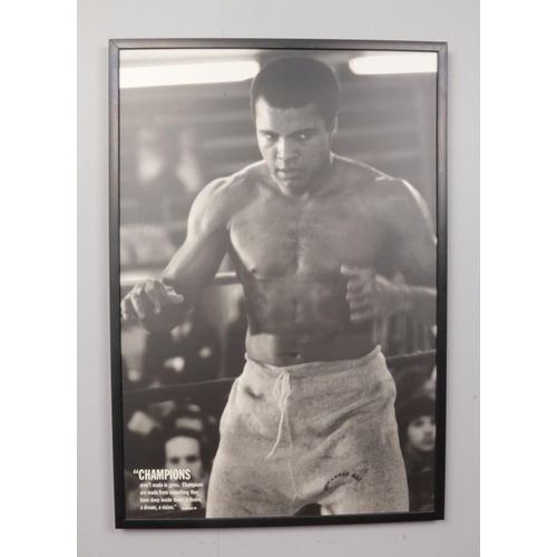 176 - Two framed monochrome prints of Muhammed Ali with quotes. H: 89.5cm, W:60cm.