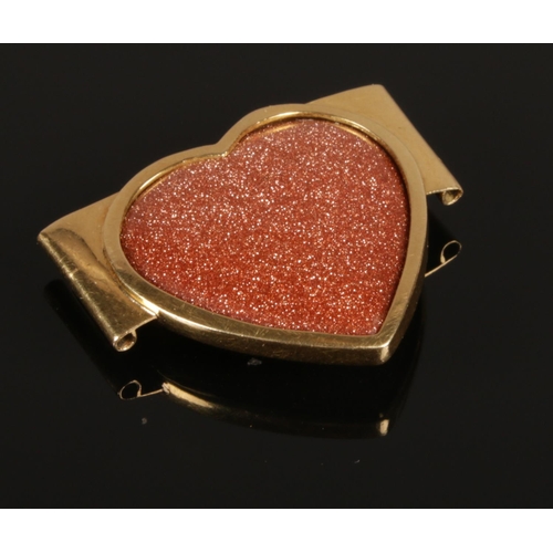 199 - A heart shaped bracelet piece with 18ct gold mount. Weight 8.56 grams