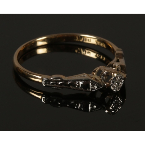 204 - An 18ct gold & platinum diamond ring . Size L.