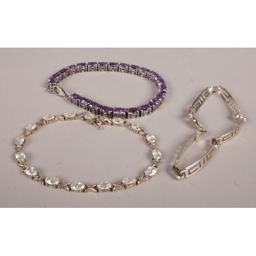 257 - Three silver bracelets. Including coloured and white paste stones, etc.