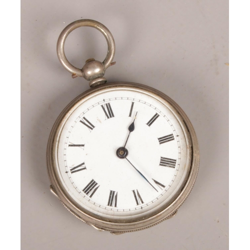 259 - A silver fob watch with roman numeral markers.