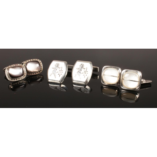 263 - Three pairs of silver cuff links, gross weight 36g.