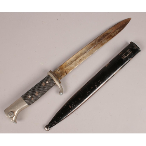 282 - A WWII German bayonet stamped WKC with scabbard.