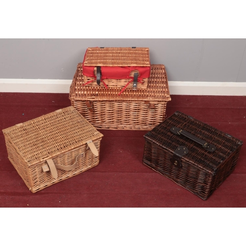 397 - Three wicker picnic baskets.