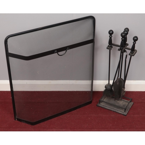 405 - A metal fireside companion set along with a metal fire guard.