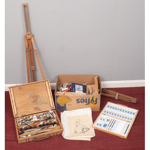 490 - A quantity of artists equipment. Including paint sets, easels, etc.