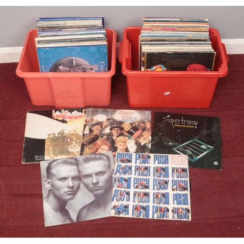 493 - Two boxes of LP records. Including Led Zeppelin, Status Quo, Supertramp, ELO, Roxy Music, Bros, etc.