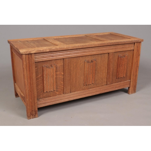 336 - An Oak linen fold detailing panelled coffer. 94cm width 45cm height.