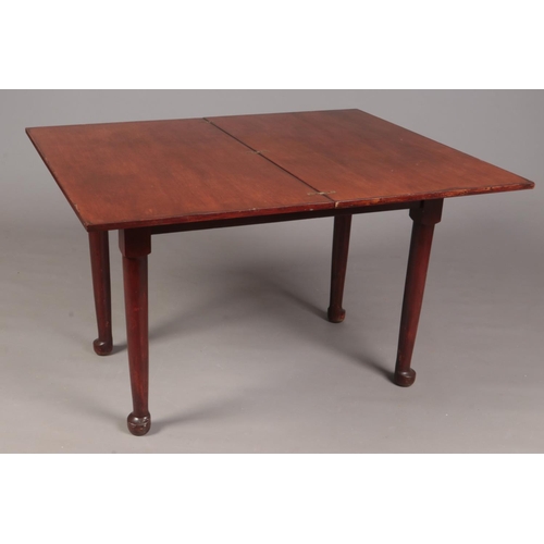 351 - A Mahogany lift and twist top table. H: 73cm, W:98cm, W: opened fully 120cm.