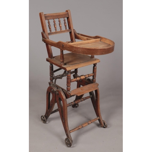 391 - An early 20th century metamorphic high chair/rocker.