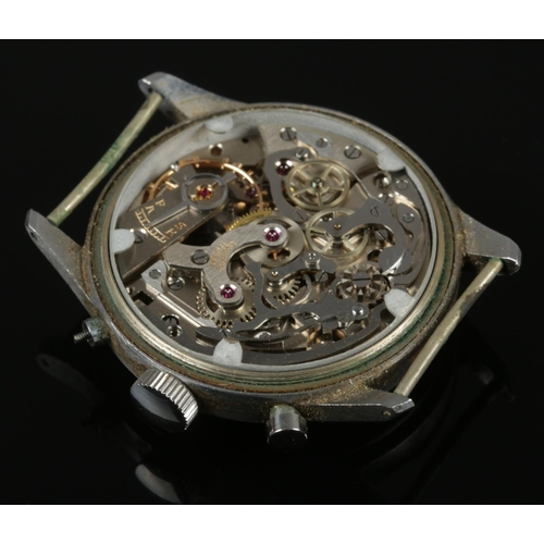 A vintage stainless steel Piaget chronograph watch head. Leonidas