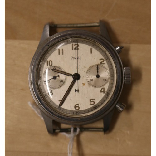 A vintage stainless steel Piaget chronograph watch head. Leonidas