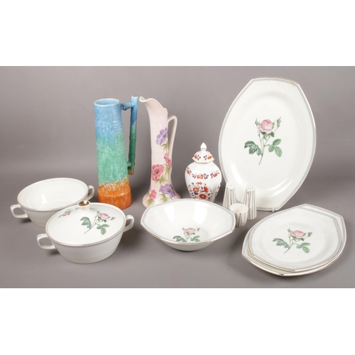 62 - A selection of named ceramics. To include a Figgio Flint Norwegian Rose part dinner set, a Wedgwood ... 