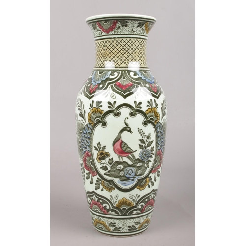 73 - A Villeroy & Boch vase in the 'Paon' pattern. H: 24cm.
