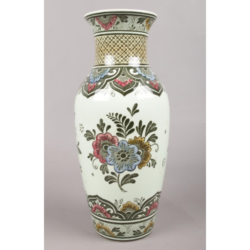 73 - A Villeroy & Boch vase in the 'Paon' pattern. H: 24cm.