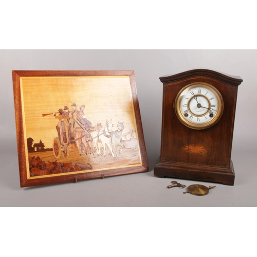 84 - An early 20th Century Mahogany marquetry inlaid mantel clock, along with a marquetry picture. Compri... 