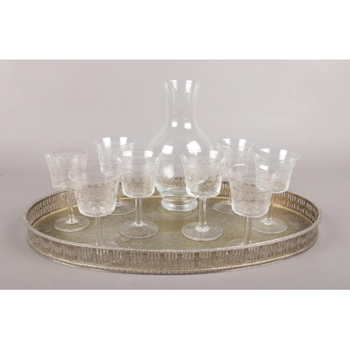 91 - A Silver plated butler tray with small etched decanter and eight matching Pall Mall liqueur glasses.