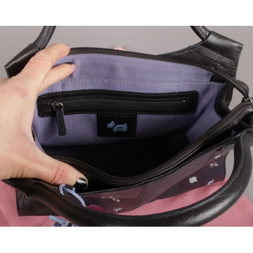 96 - A Black Radley handbag. (with dust cover)