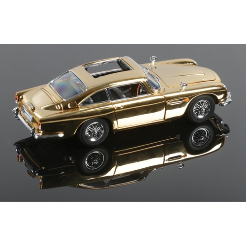 A Danbury Mint Special edition James Bond Aston Martin DB5, Gold