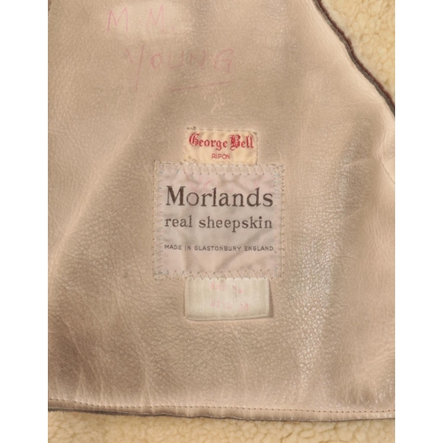 495 - Three sheepskin coats. To include a Richard Draper light brown with brown piping Size 12 - a George ... 