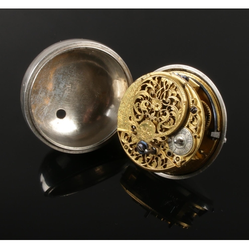 400 - A silver pair cased pocket watch. With verge escapement, painted enamel dial with Roman numeral mark... 