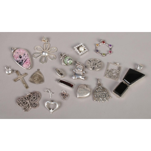 364 - Twenty silver pendants. Includes stone set examples.