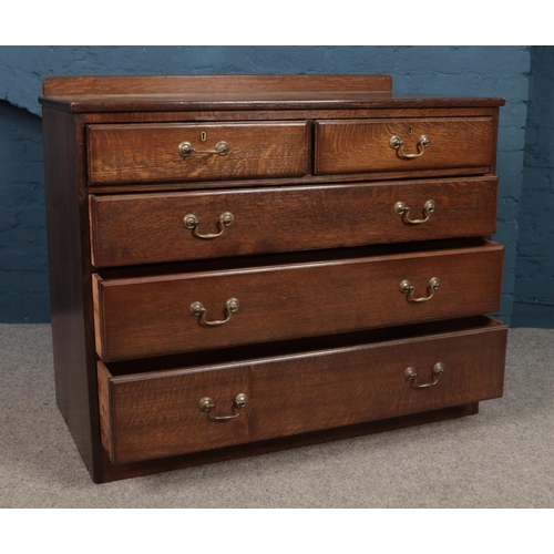 456 - An Georgian style oak chest of drawers. H:86.5cm, W:109cm, D:55cm.