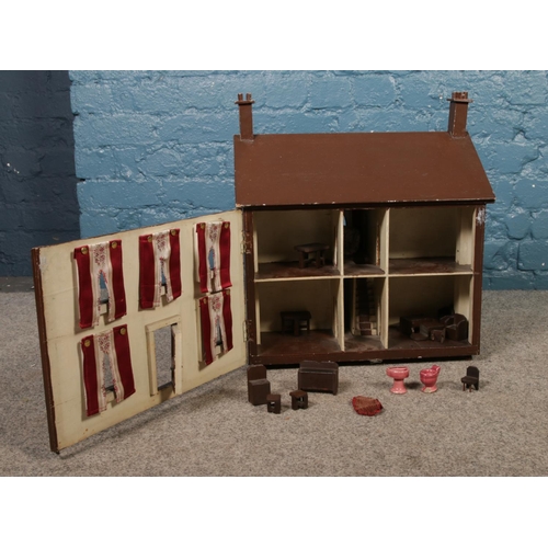 243 - A double sided wooden dolls house with contents. H:51.5cm W:47cm.