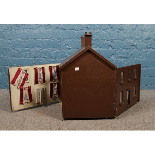 243 - A double sided wooden dolls house with contents. H:51.5cm W:47cm.