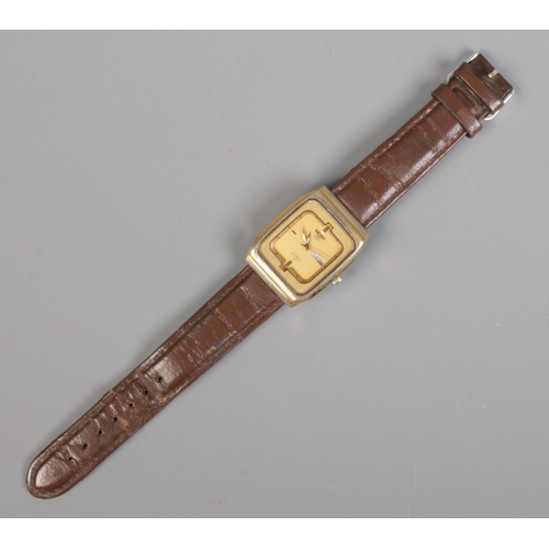 334 - A Gent's Seiko 5 automatic wristwatch, with 17 jewel movement, day and date markers and on brown str... 